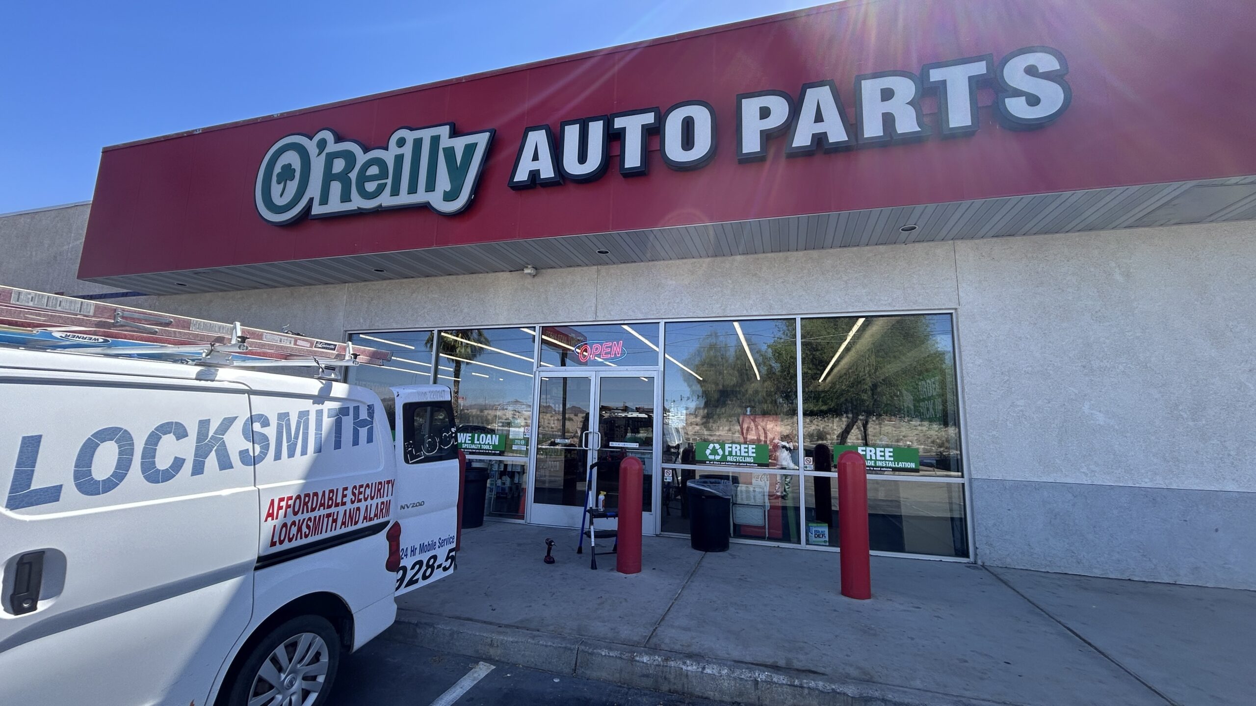 Affordable Security Locksmith And Alarm Working On A Door For Oreilly Auto Parts In Yuma